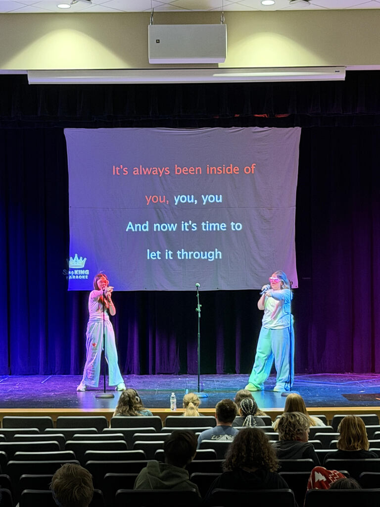 Students singing karaoke