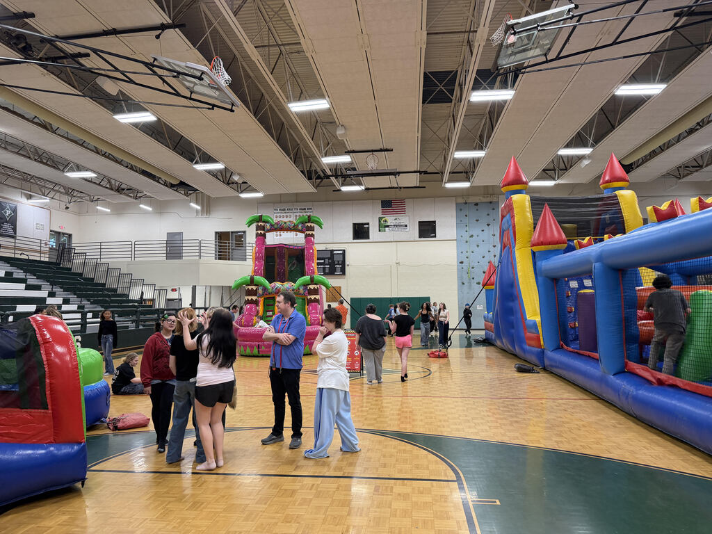 Student playing in gym