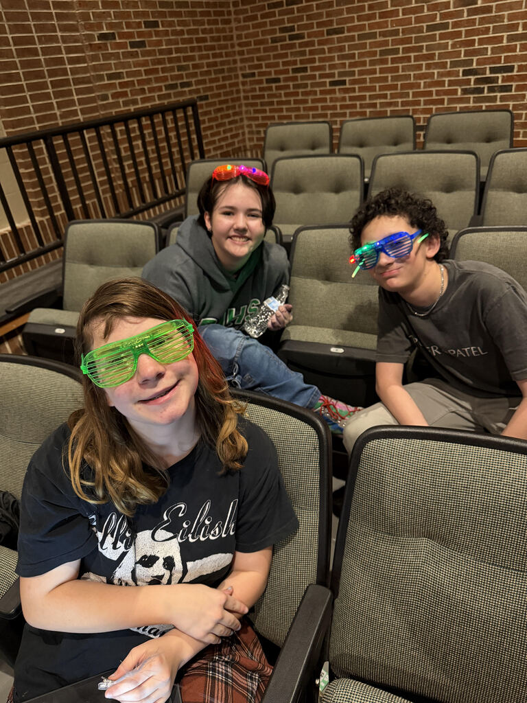Three students posing for a picture