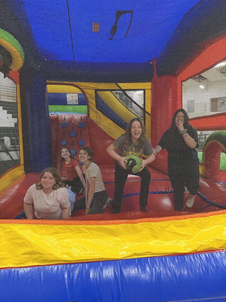 Students in a bounce house