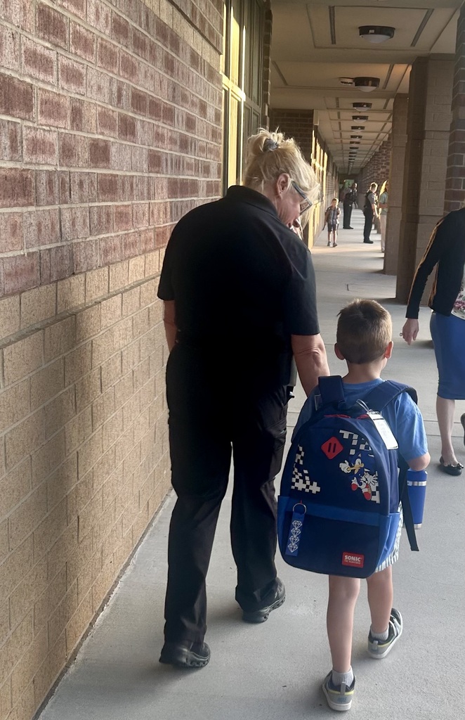 Students arriving for the first day of school.
