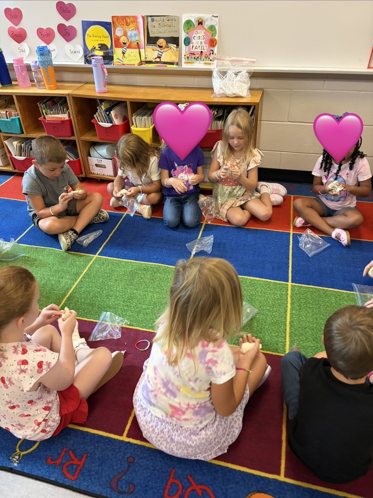 rs. Abbott's kindergarten read "Our Class is a Family," and celebrated their unique classroom family with Play-Dough and family bracelets.