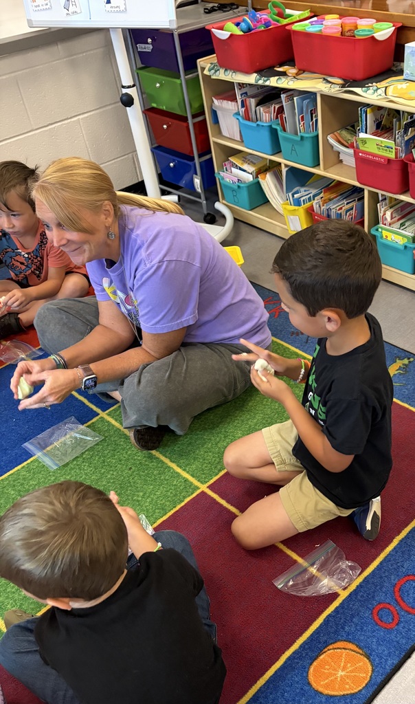 rs. Abbott's kindergarten read "Our Class is a Family," and celebrated their unique classroom family with Play-Dough and family bracelets.
