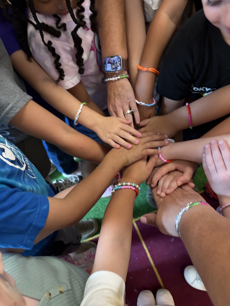 rs. Abbott's kindergarten read "Our Class is a Family," and celebrated their unique classroom family with Play-Dough and family bracelets.
