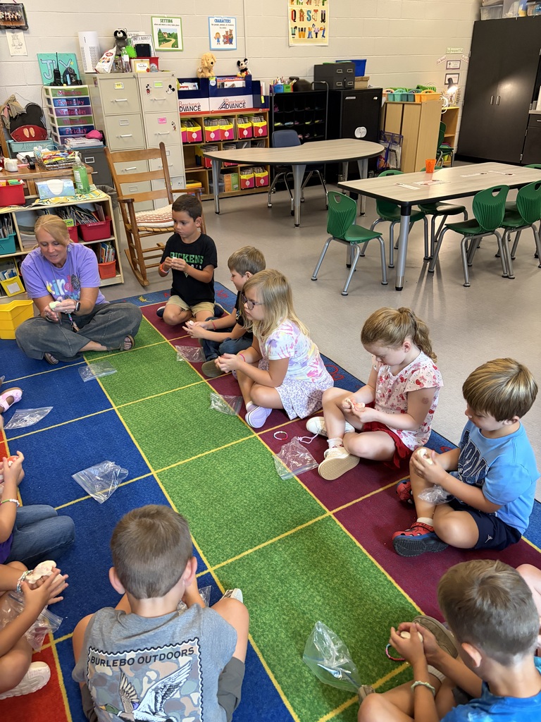 rs. Abbott's kindergarten read "Our Class is a Family," and celebrated their unique classroom family with Play-Dough and family bracelets.