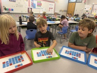 Mrs. Shealey's first graders in small group and center time reviewing  "short a."