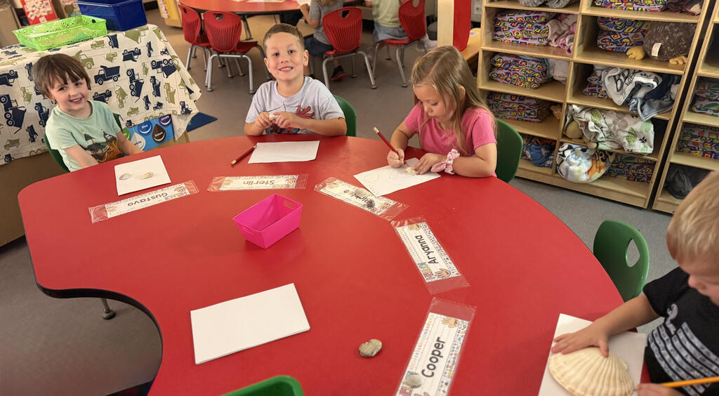 Mrs. Hamilton's PreK traced and identified seashells by size—small, medium, and large and also sorted foam beads by color and practiced our fine motor skills by stringing beads.