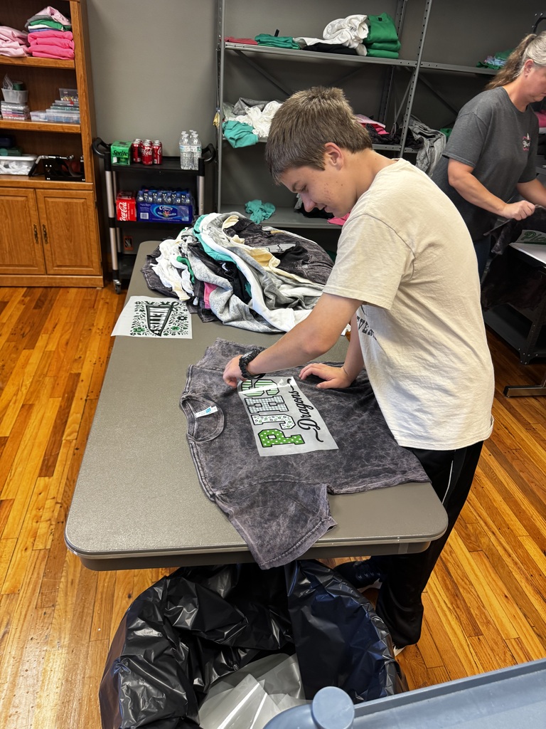 student working on t shirt