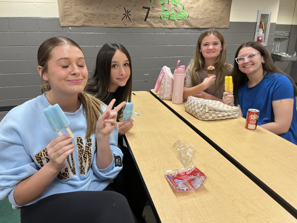 Group of girls enjoying popsicles