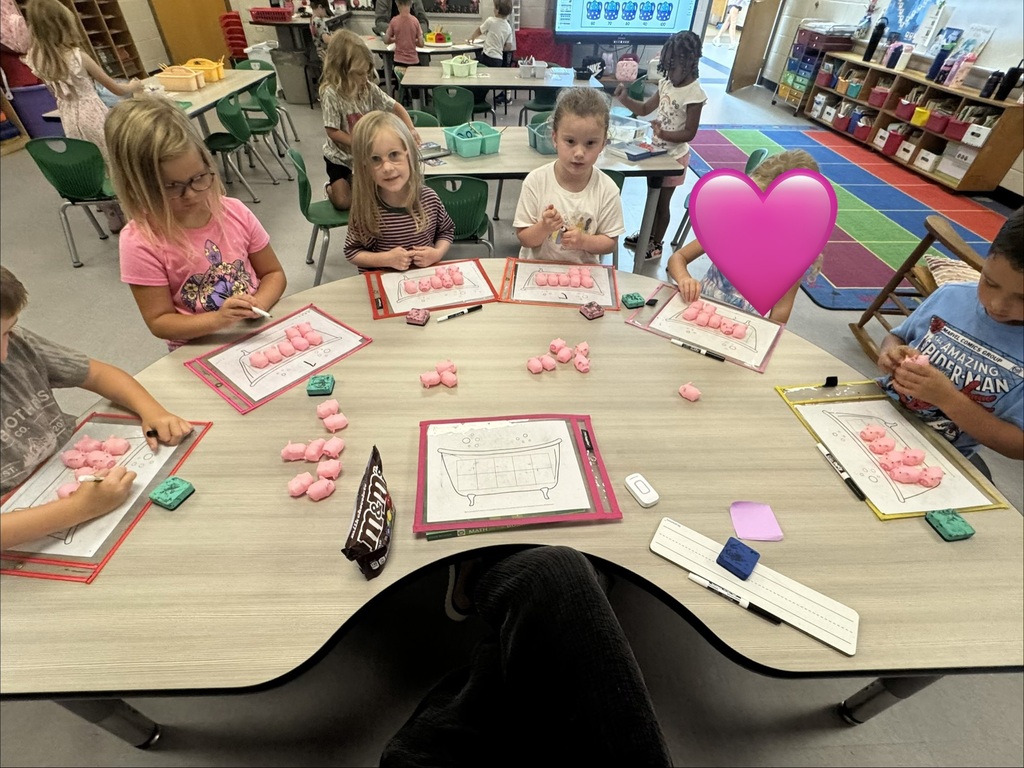 Mrs. Abbott’s kindergartners read Ten Pigs: An Epic Bath Adventure and then put their counting skills to work! They used pigs to fill “bath” ten frames and write the matching numerals