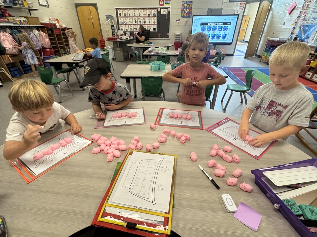Mrs. Abbott’s kindergartners read Ten Pigs: An Epic Bath Adventure and then put their counting skills to work! They used pigs to fill “bath” ten frames and write the matching numerals
