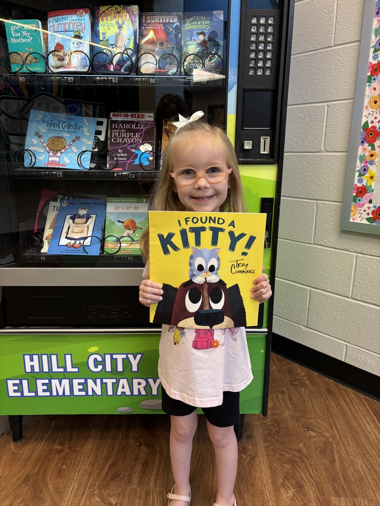 Lily from Mrs. Abbott's class earned a trip to the Book Vending Machine.