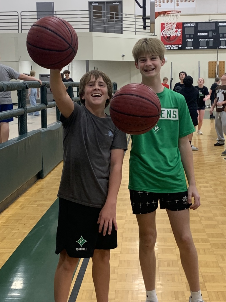 boys posing with basketballs