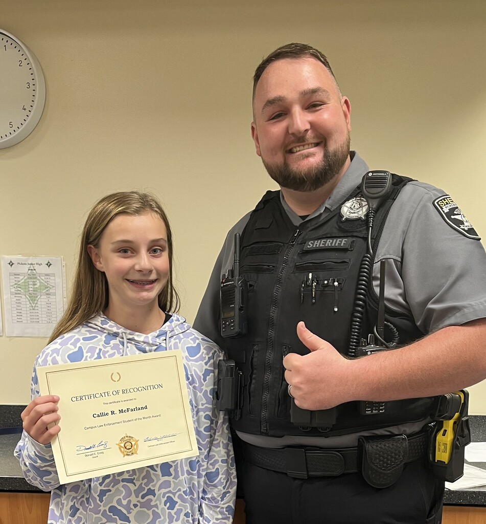 Callie McFarland with PJHS SRO Blake McClure