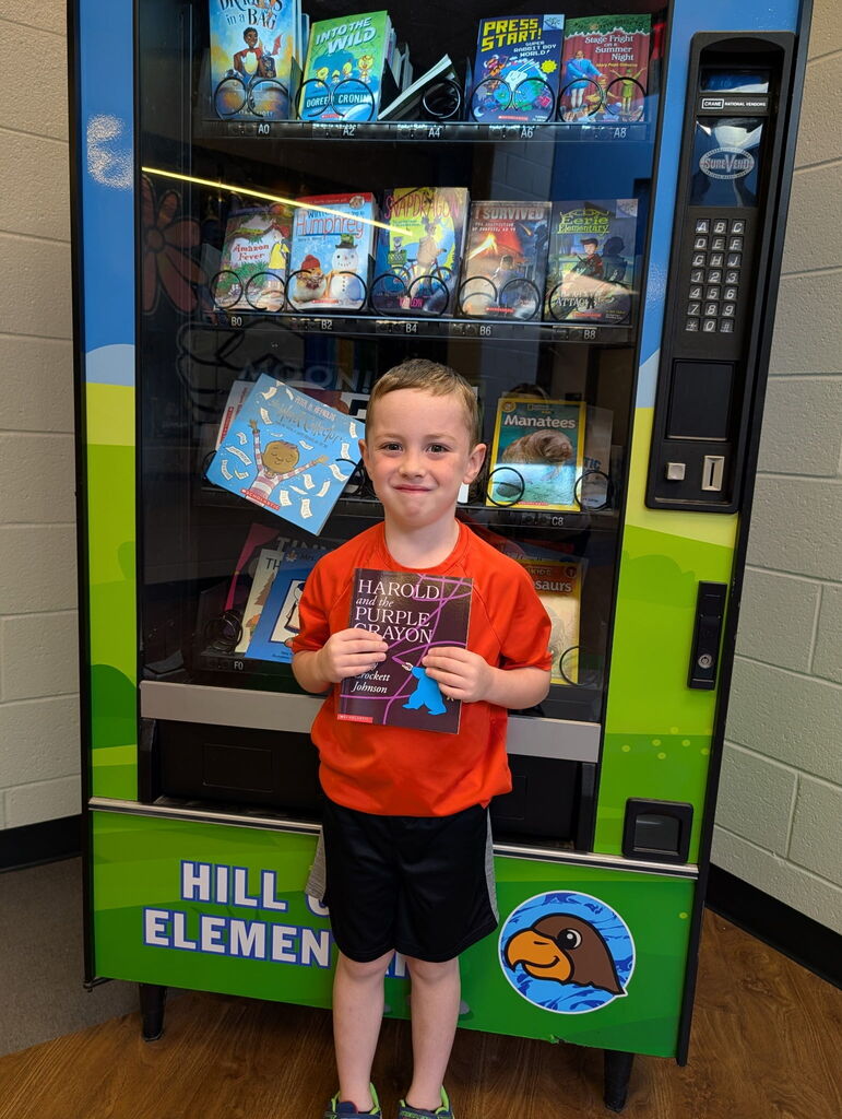 Lane visited the Book Vending Machine for his fluency folder.