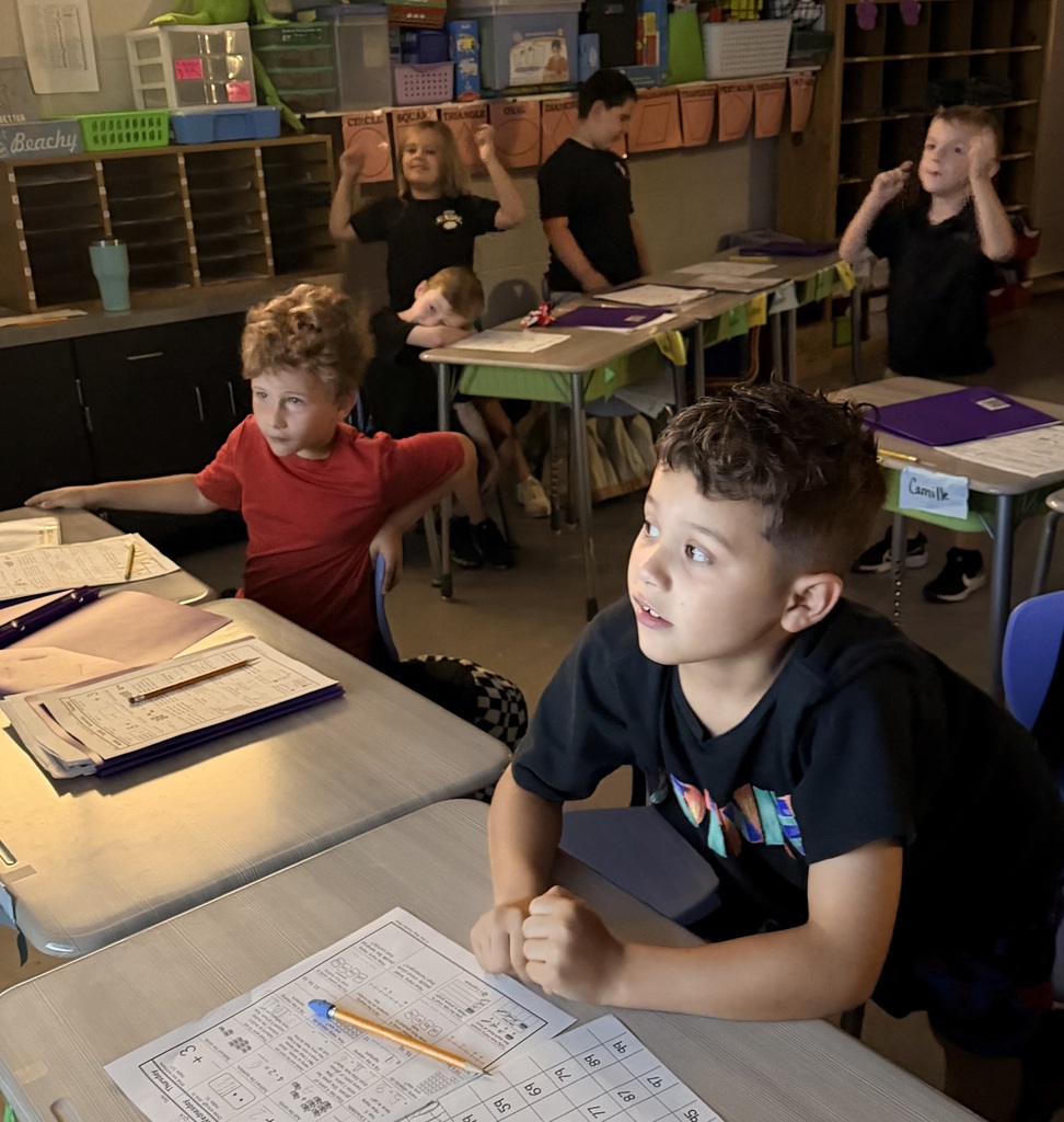 Ms. Sultan's class practicing counting forward & backwards to 120 to counting songs. 