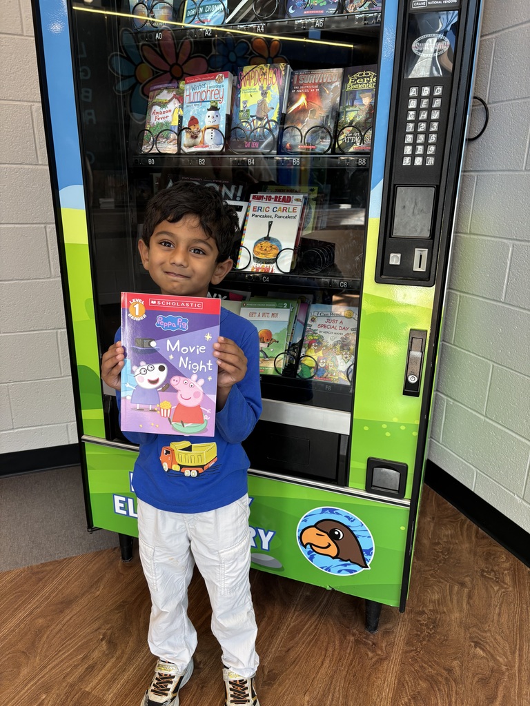 Naksh visited the Book Vending Machine for finishing his fluency folder.