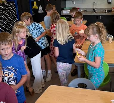 Students in kindergarten and first grade engineered kindness buckets in STEM.