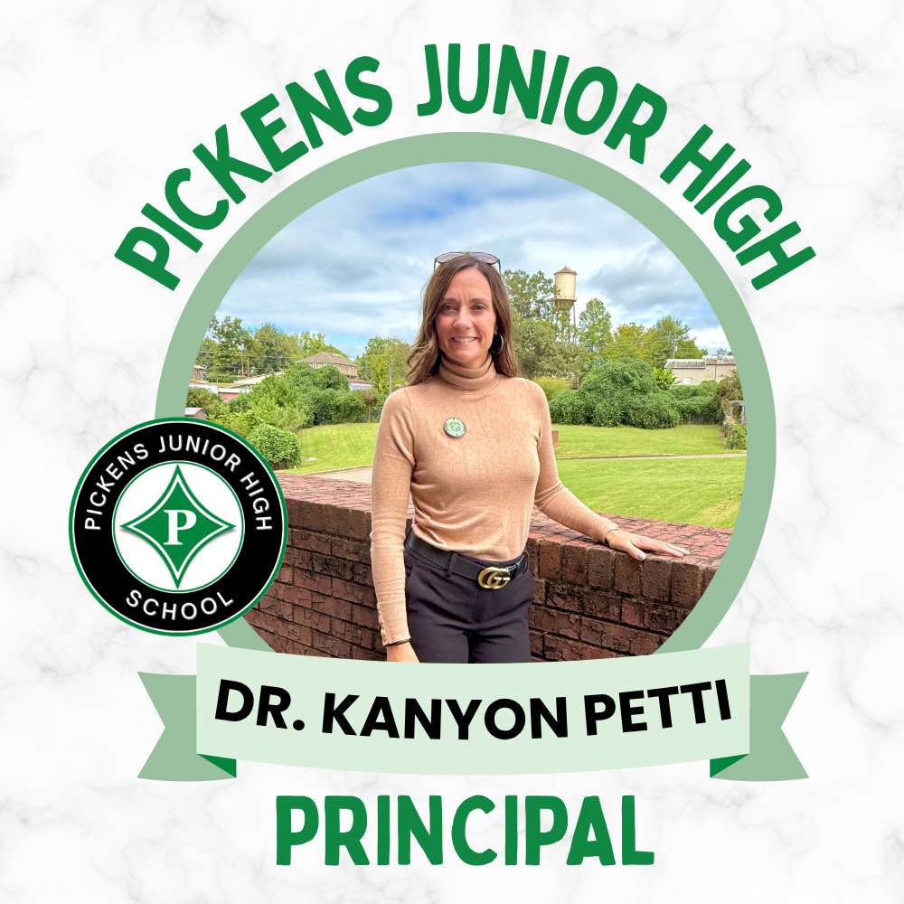 Pickens Junior HIgh Dr. Kanyon Petti standing for a photo.