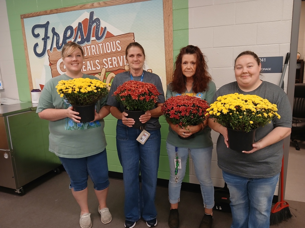 Mandy, Anita, Cricket, and Tiffany received flowers for National Custiondian Appreciation Day.