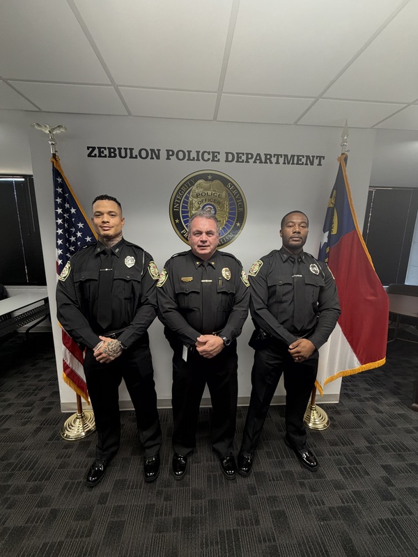 Chief with two officers at swearing in