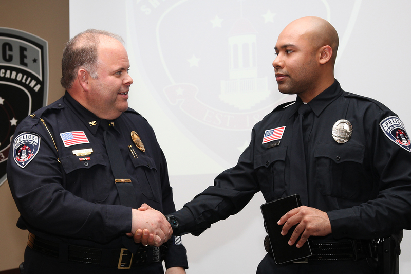 Officer Potlow with Chief Fraser