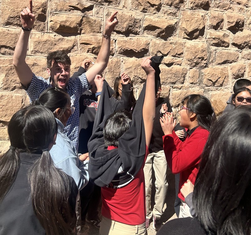 Students playing a game with Franciscan University Students