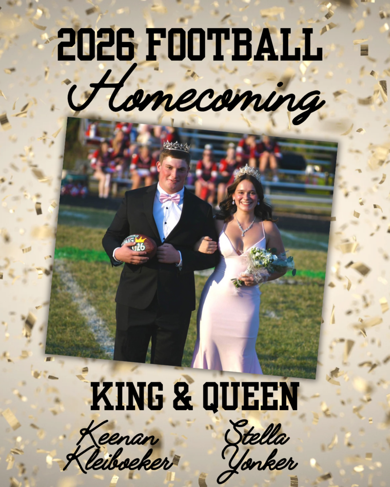 homecoming king and queen on football field
