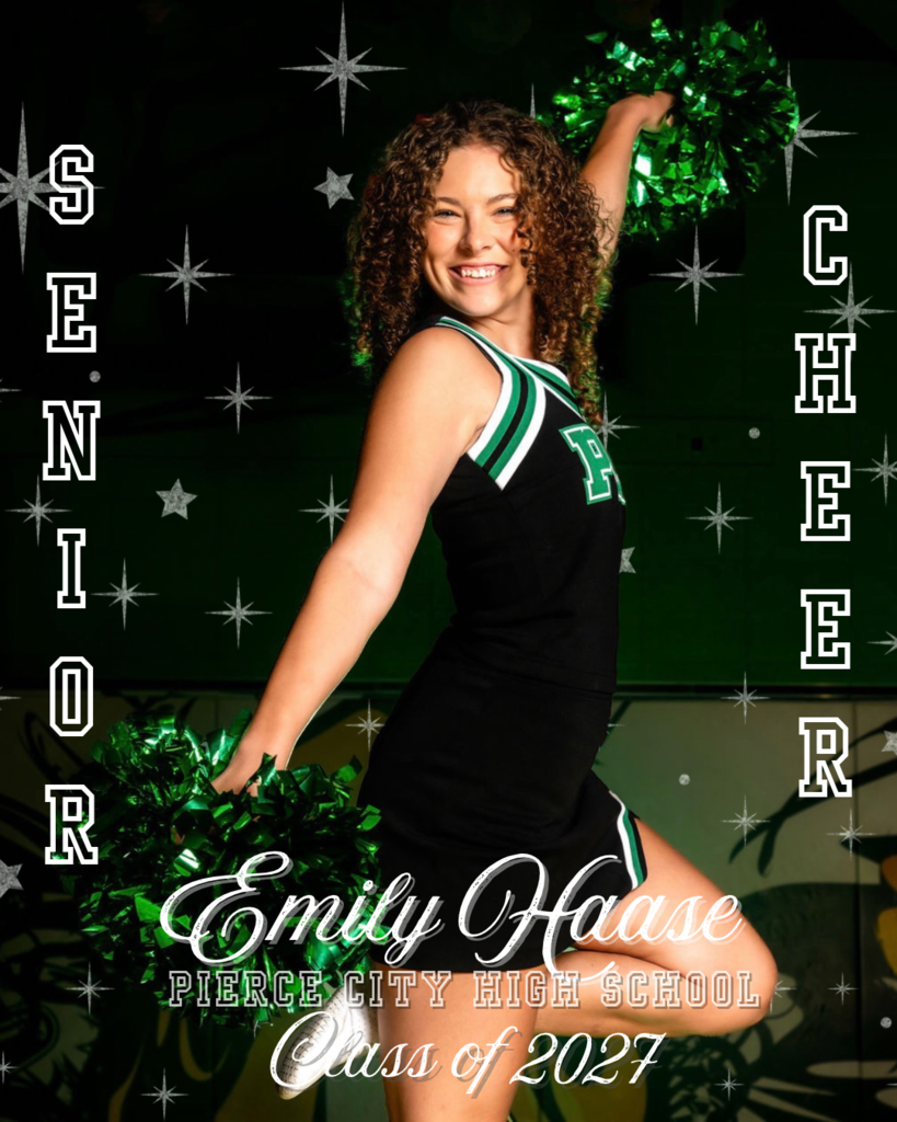 smiling cheerleader holding pompoms