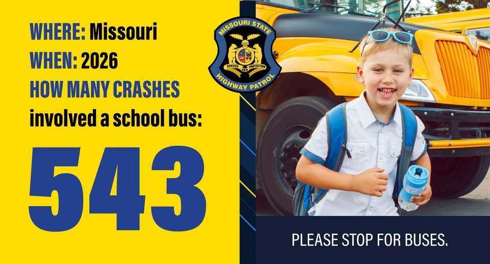 student in front of bus