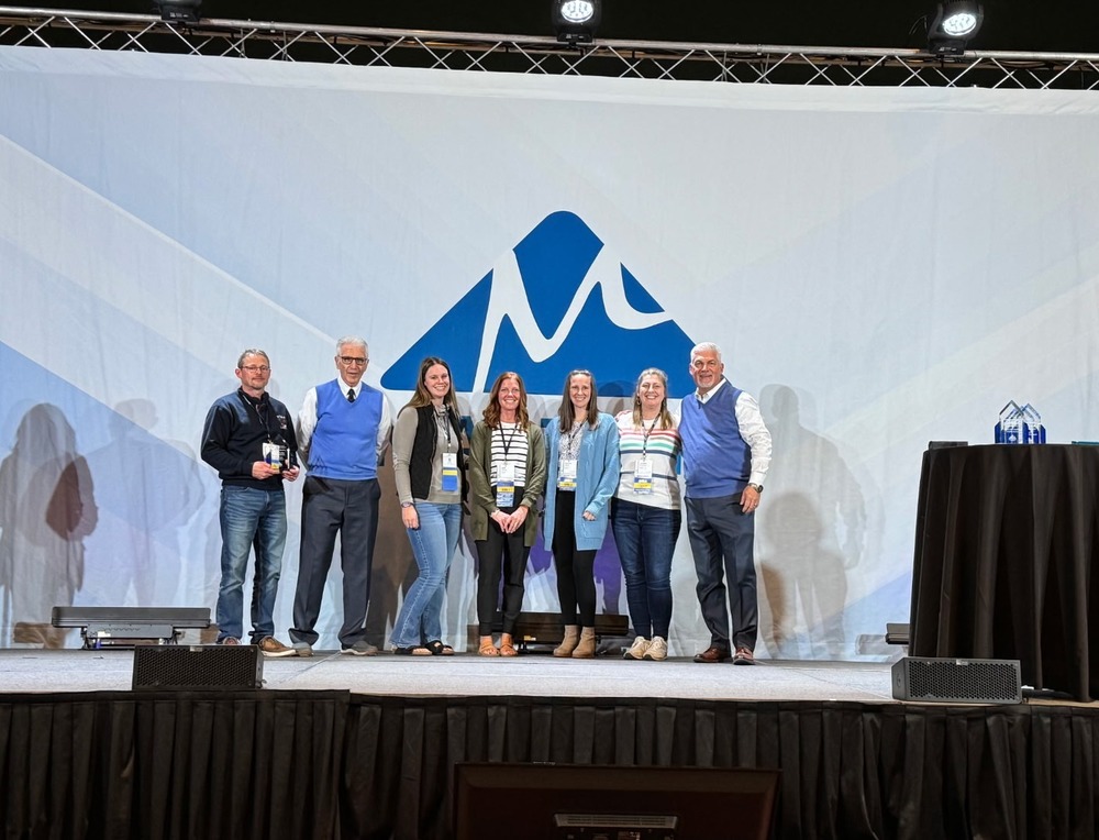 Staff from Pioneer Elementary accepting award