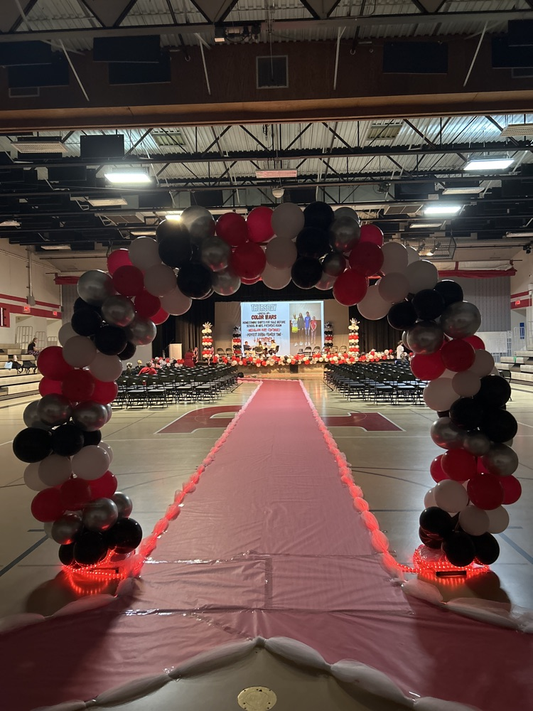 balloons and decor in gym for homecoming 