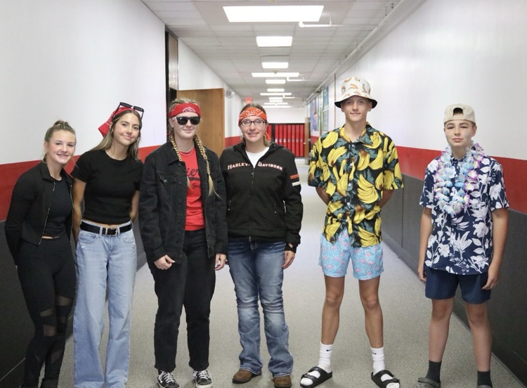 students dressed up in moto and surfer theme