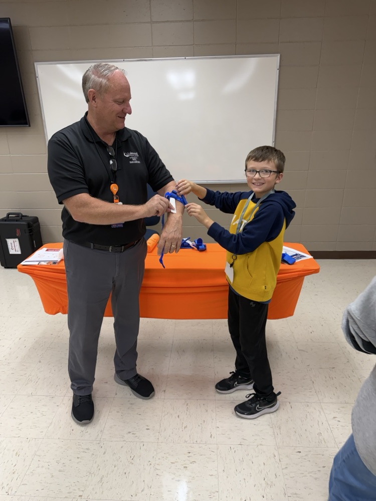 man and student in science project