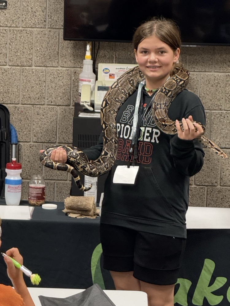 student with snake