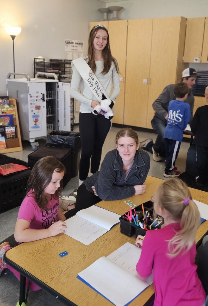 students working with kindergartners