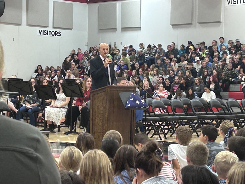 George Weber addressing students  in MAC gym