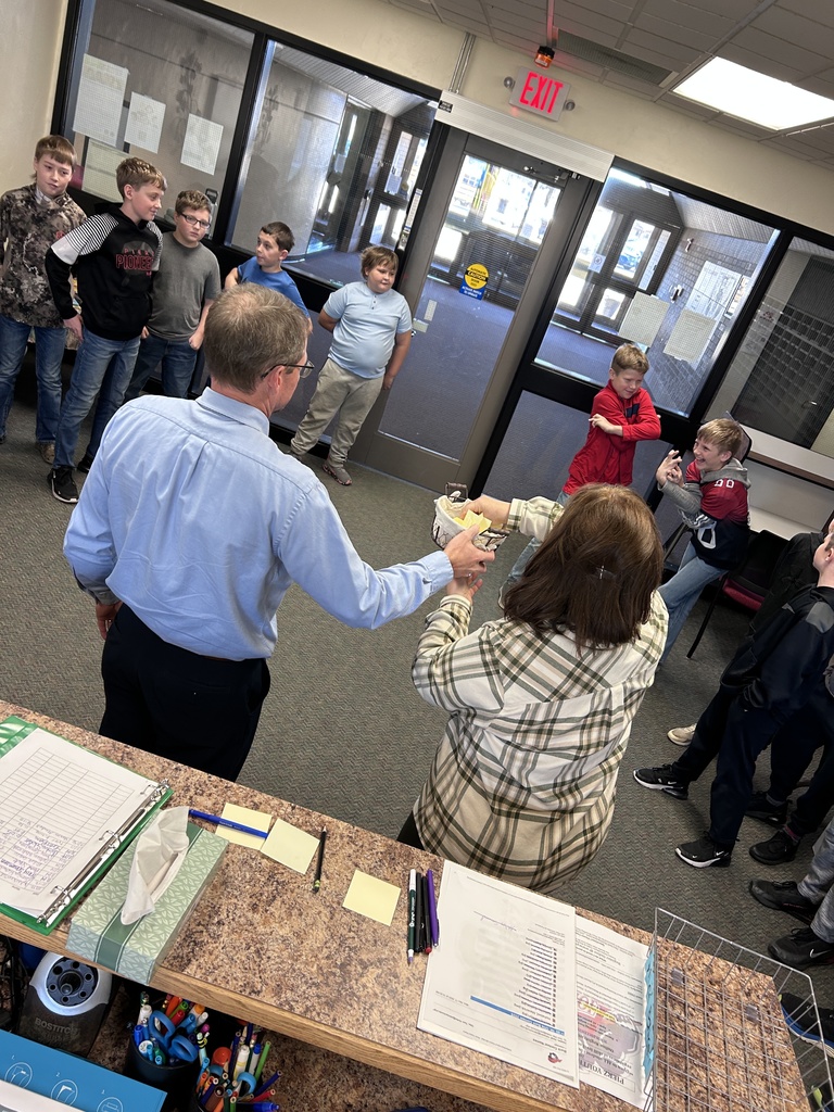 Mr. Otte and Maureen drawing for winners