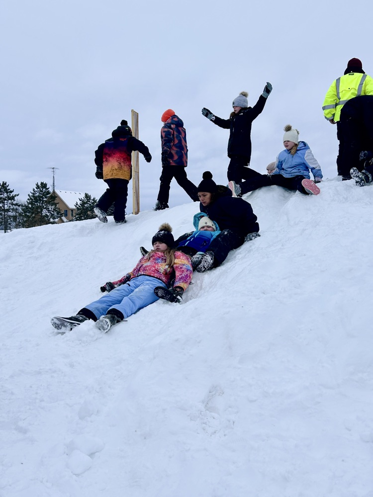 students on snow hill 