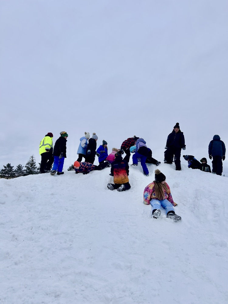 students on snow hill 