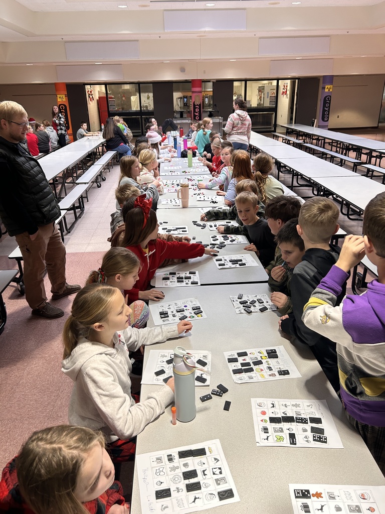 students with bingo cards in lunchroom