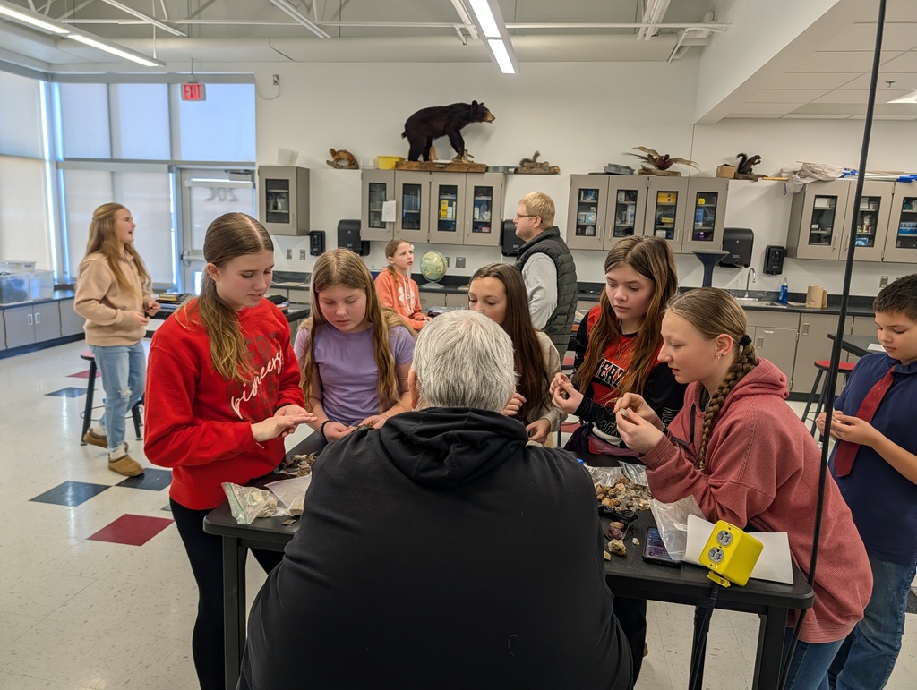 students around Rick