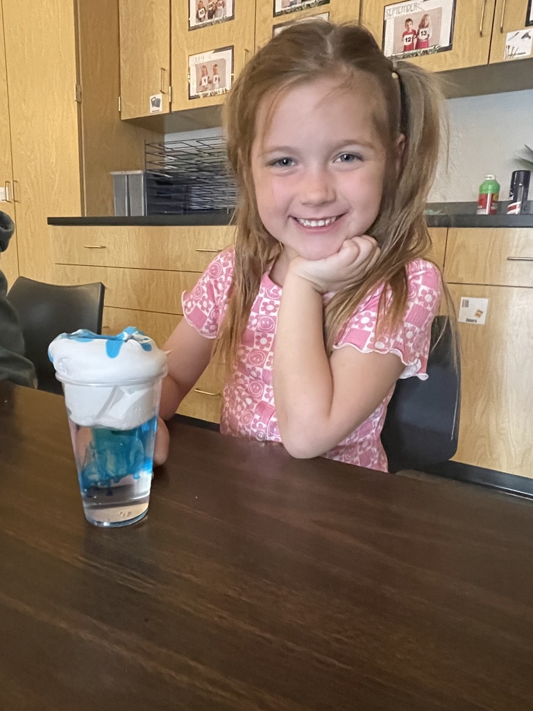 smiling girl with storm jar