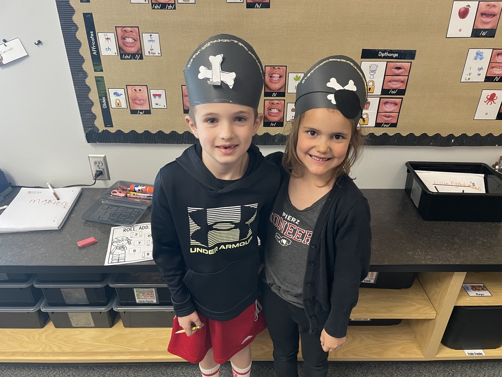 boy and girl student dressed like pirates