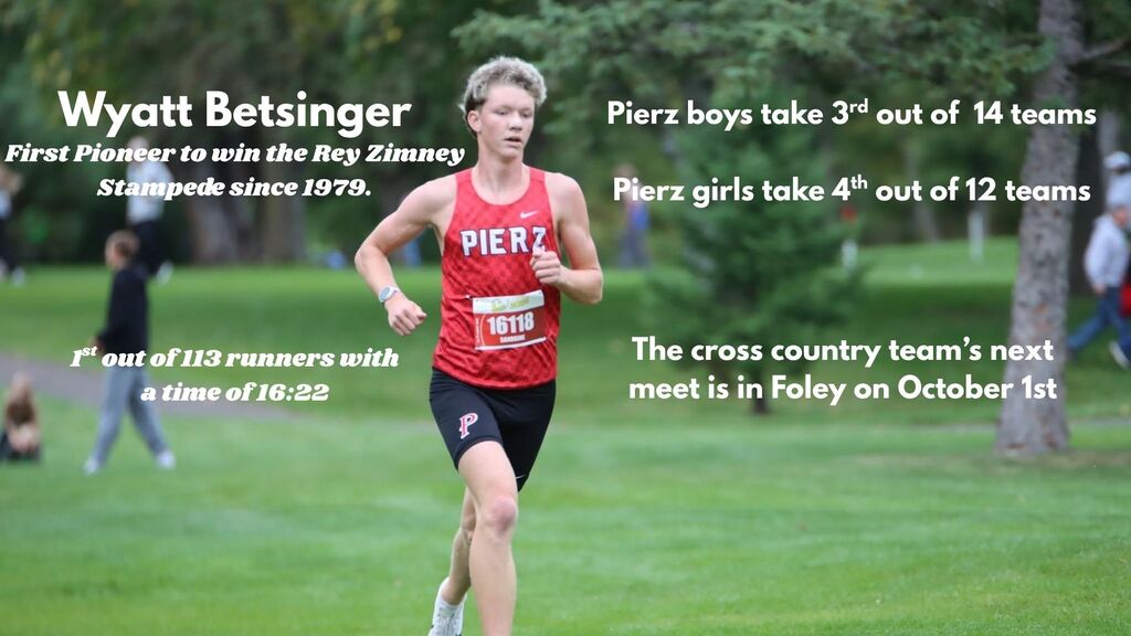 High school male runner competing in uniform.