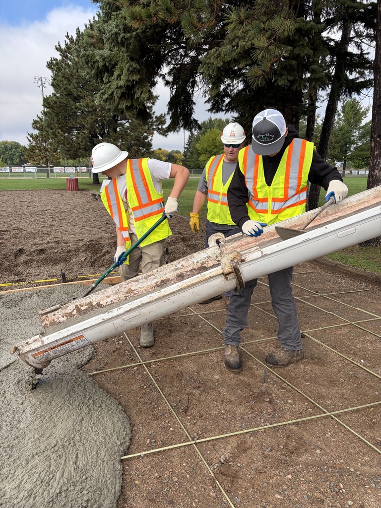 3 guys pouring concrete