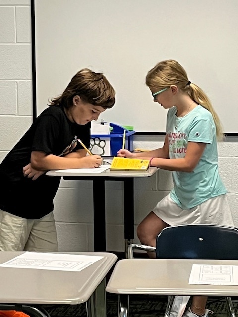 Students reading a book