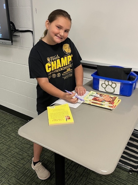 Students reading a book