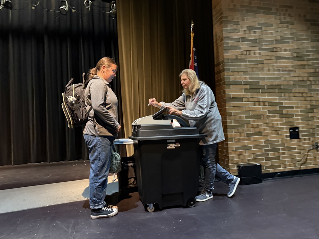 Students waiting in line to vote