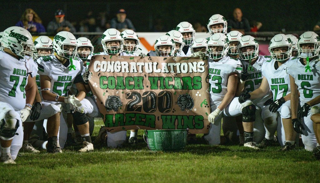 footballplayers with their banner